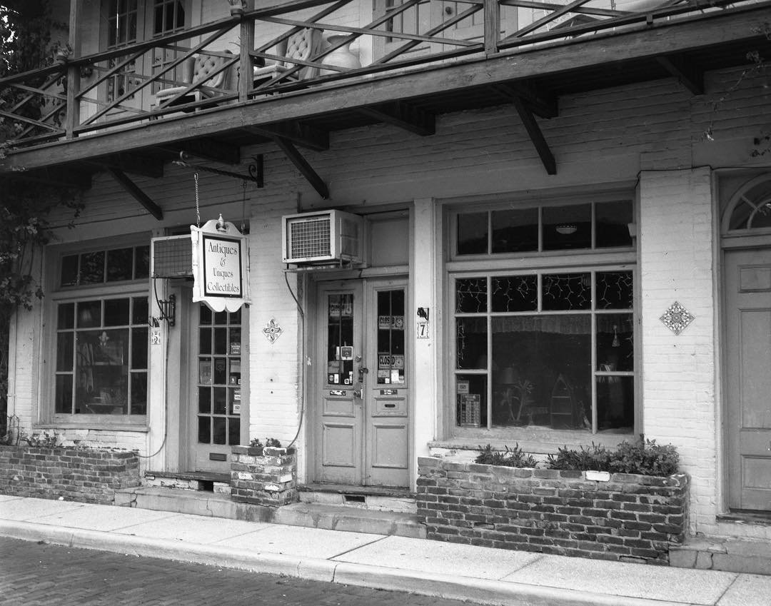 Antiques & Uniques Collectibles on Aviles Street, St.Augustine, Florida. Shot in October when we were visiting my mom using my Speed Graphic on Tri-X 320 and developed in Rodinal. #film #filmphotography #filmphotographic #largeformat #filmisnotdead #itjustsmellsfunny #filmphoto #speedgraphic