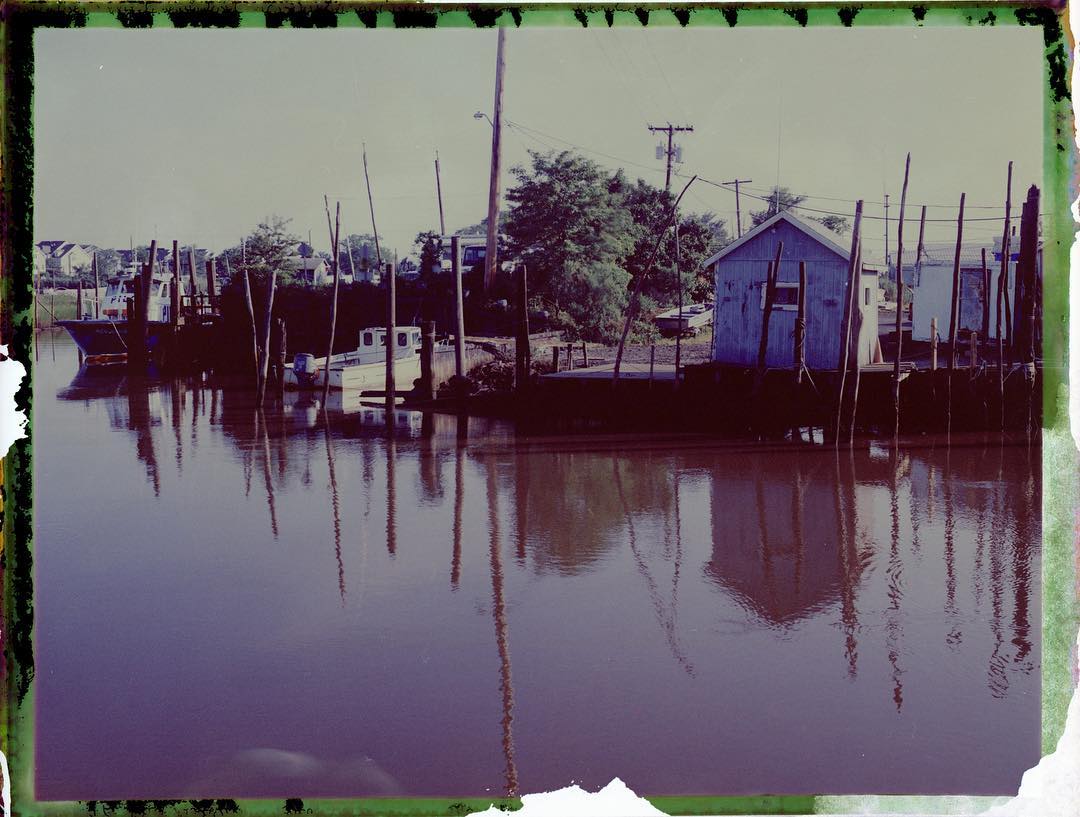Belford Harbor. More Fuji FP-100C through the Polaroid 195, negative reclaimed and scanned. #polaroid195 #polaroid #polaroidpackfilm #fujifp100c #negative #film #filmphotography #filmphotographic