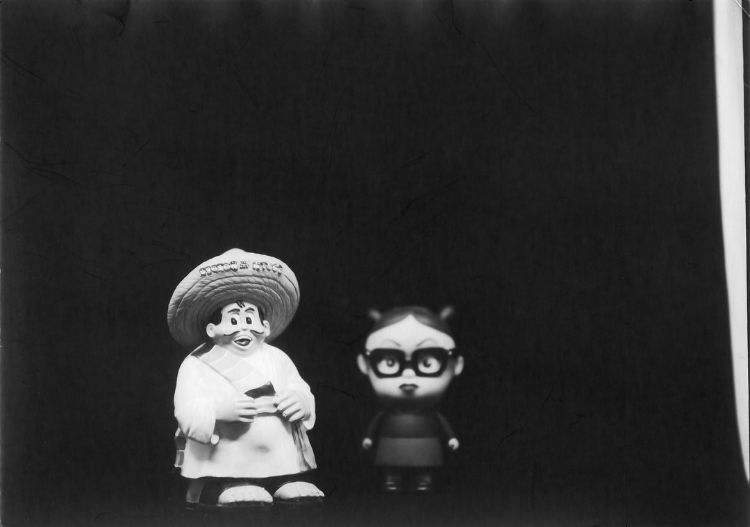 Pedro and Enid

Another shot on #ilforddirectpositivepaper with the 1902 Century No. 5 #5x7camera and the #foldio. I wanted to see how narrow the depth of field was on the no-name brass lens that came with the camera, so I placed Enid slightly behind Pedro (the mascot of everyoneâs favorite racist tourist trap, South of the Border). I probably should have placed her closer to Pedro so you could see that; this looks like theyâre in the same plane, like this is a mistake. Also, itâs not framed great, as you can see the edge of the Foldio on the right. Notes for the next try. 
I got a dry plate holder for the camera and some J. Lane dry plates, so I hope to give that a try sometime this week. 
#film #filmphotography #filmphotographic #5x7 #largeformat #antiquecamera
