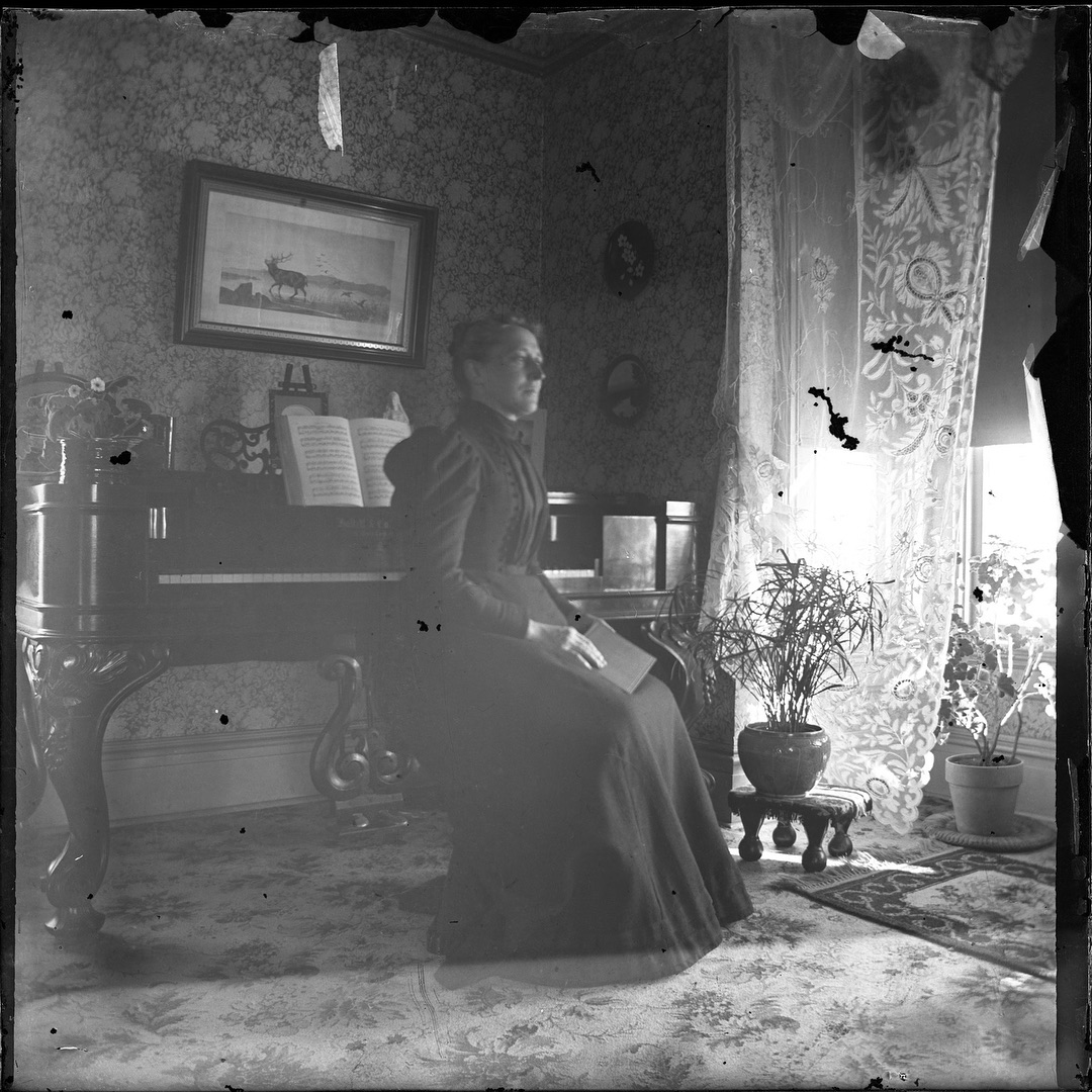 I think this is a self-portrait of Eleanora. It seems to have been taken at the same time as the first photo in this series that I posted, the 4 generations shot. This is another 4.25 x 4.25 negative. That other photo was shot on 5x7. Maybe she had two different cameras?

#dryplate #dryplatephotography #dryplatenegative #film #filmphotography #filmphotographic  #foundphoto #foundphotos #garnerfamilyarchive