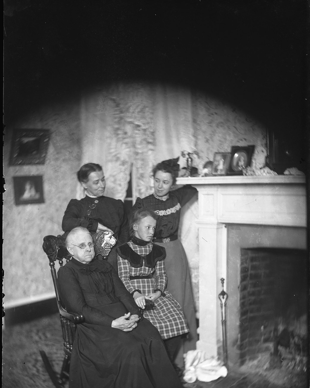 This is an interesting shot. Thereâs a 4.25 x 4.25 print of this one, but the negative is 5 x 7. With the masking, itâs like she shot this specifically to print on that paper. Like the first photo in this series, this shows four generations of the Garner family women: Harriet Murray Garner, the matriarch; Eleanora Garner Colton, Harrietâs daughter and the photographer of all these shots; Eleanoraâs daughter Loui Colton Johnston, and Louiâs daughter Helen Johnston. 
#dryplate #dryplatephotography #dryplatenegative #film #filmphotography #foundphoto #foundphotos #garnerfamilyarchive