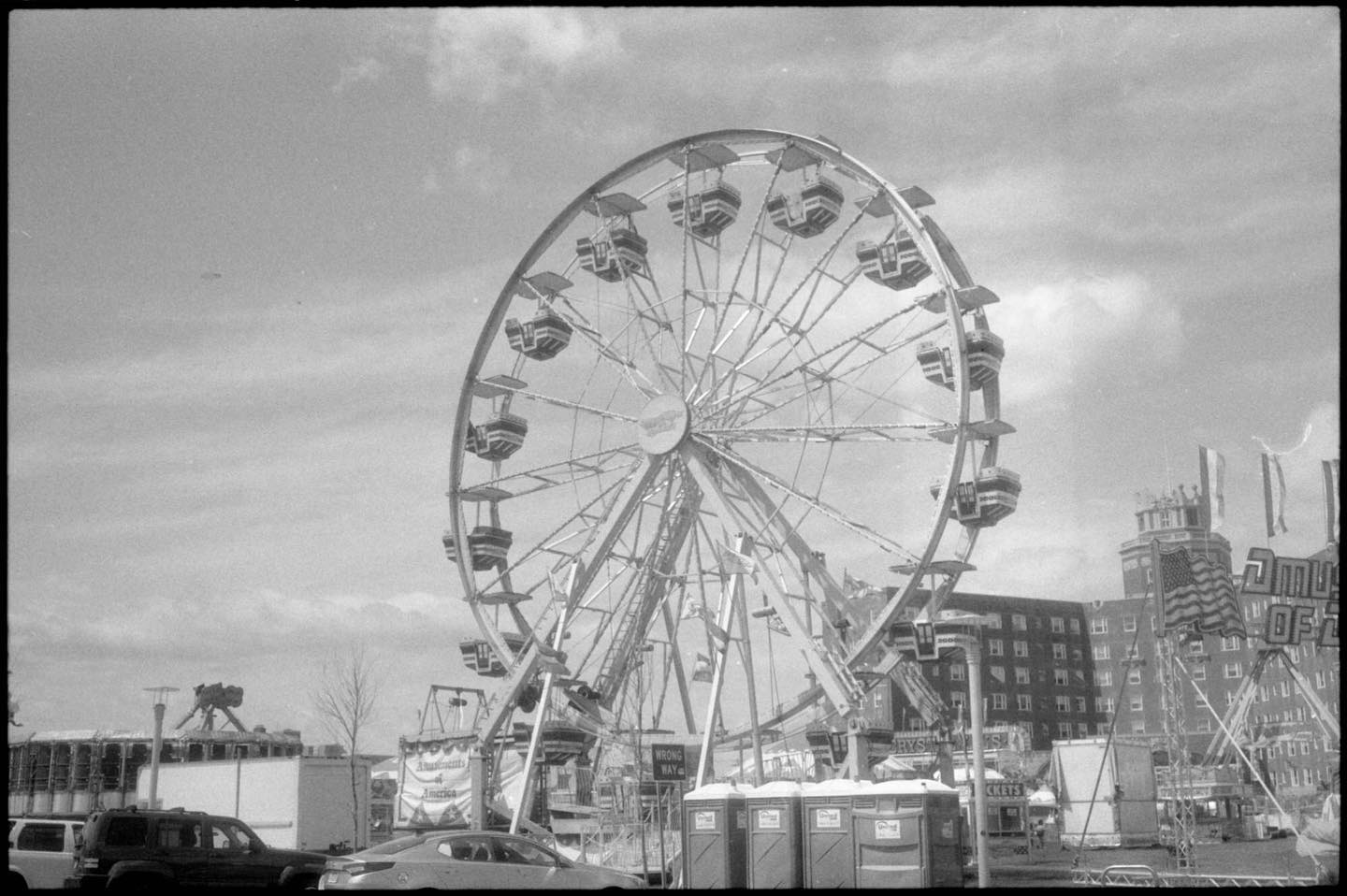 Ferris Wheel. Part of a fair set up in Sunset Park in Asbury Park, across the street from Convention Hall. #canonetql17giii #jchstreetpan400 #rollfilmweek #rollfilmweek2019 #film #filmphotography