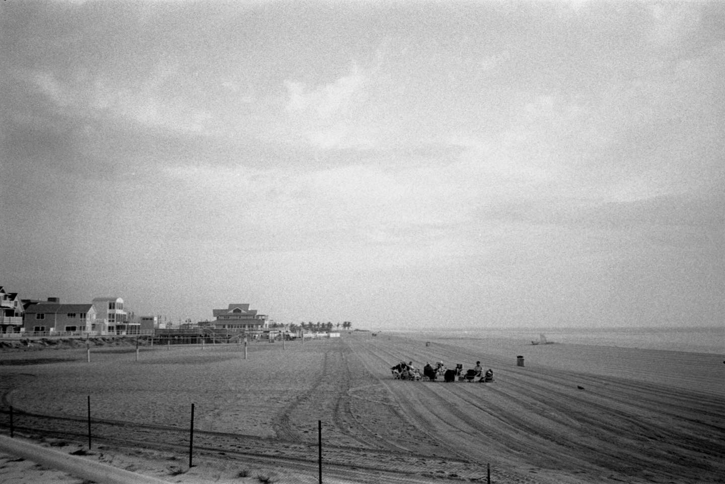 Early morning meeting 
Probably some religious group or something sitting on the beach in a circle of chairs at 7:30 in the morning. Shot with my #olympusxa on @Kodak #superxx and developed in #rodinal in my @arsimago #labbox. #film #filmphotography #filmphotographic #staybrokeshootfilm