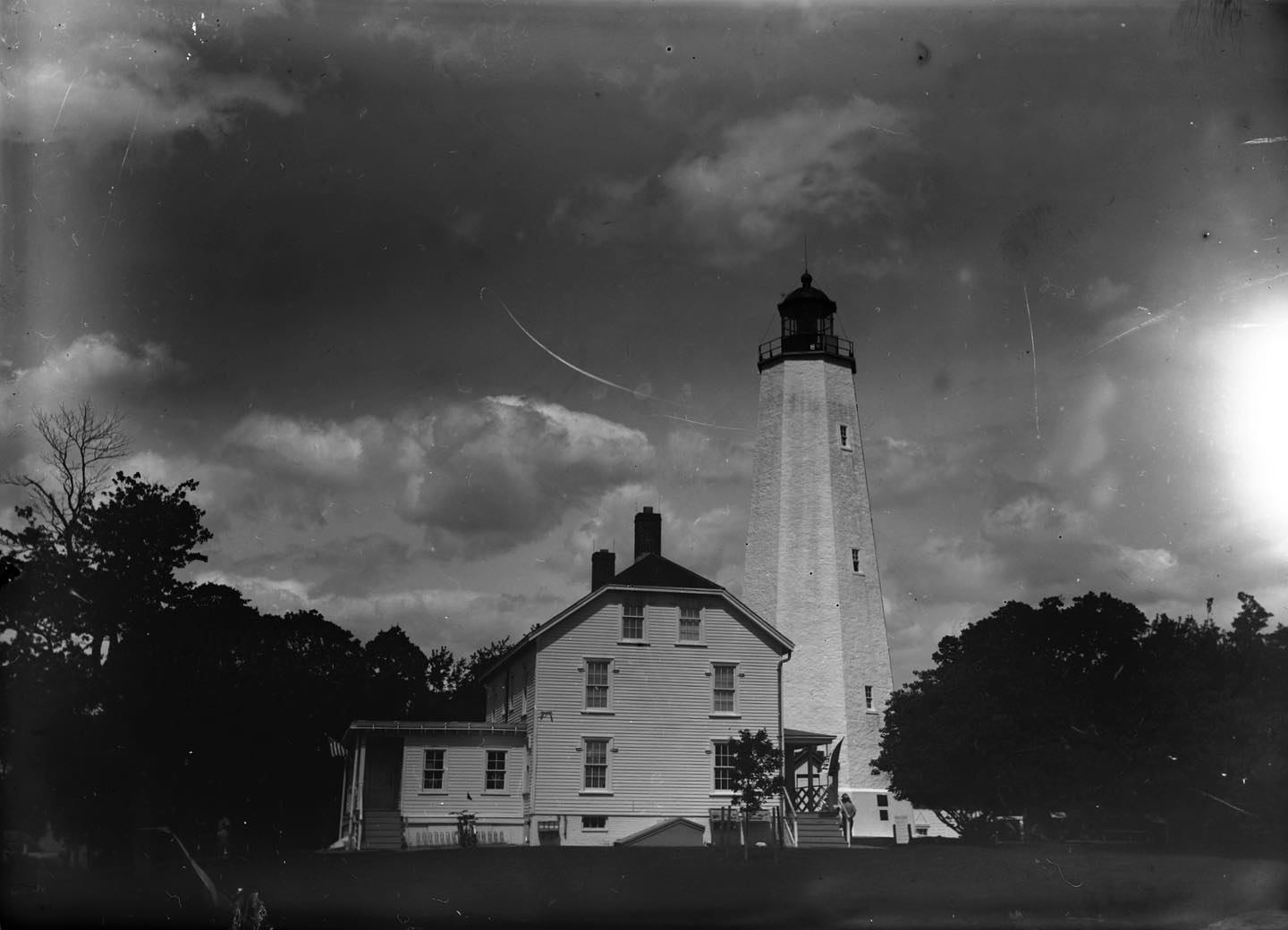 Sandy Hook Lighthouse. 
Shot on @pictoriographica Speed Plate (ISO 25) with my 1902 Century Studio No. 5. No-name Symmetric lens in a B&L pneumatic shutter, 1/5 second @ f/32. Developed by inspection in HC-110 Dilution B, 5 minutes or thereabouts. Really looking forward to the plate holders Jason and @chromacamera just completed a successful Kickstarter for so I (hopefully) donât get light leaks like in this shot from a vintage plate holder.  #dryplate #dryplatephotography #5x7 #5x7photography #film #filmphotography #filmphotographic #largeformat