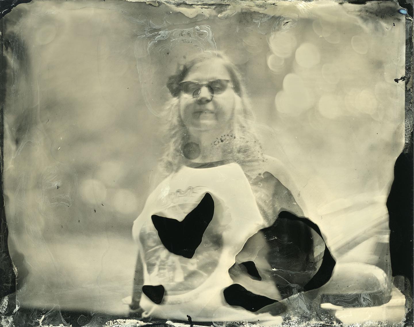 Laura

While I had everything set up, I couldnât resist making a second tintype this weekend. This one misses the veiling from the first, but makes up for it with both developer island *and* developer burns. I have to say I love the roughly heart-shaped perfectly place island, though. #tintype #tintypephotography #wetplatecollodion #largeformat #speedgraphic #aeroektar
